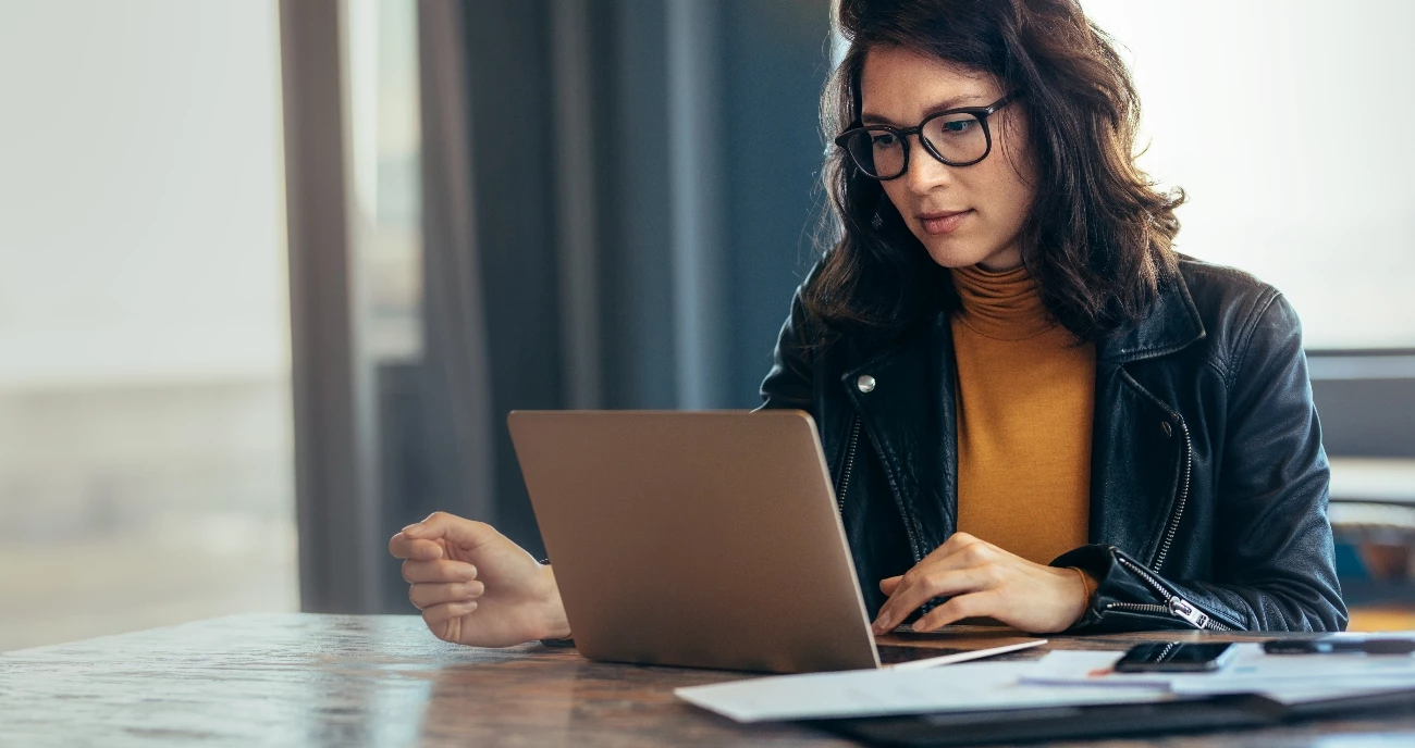 Freelancer Looking At Laptop