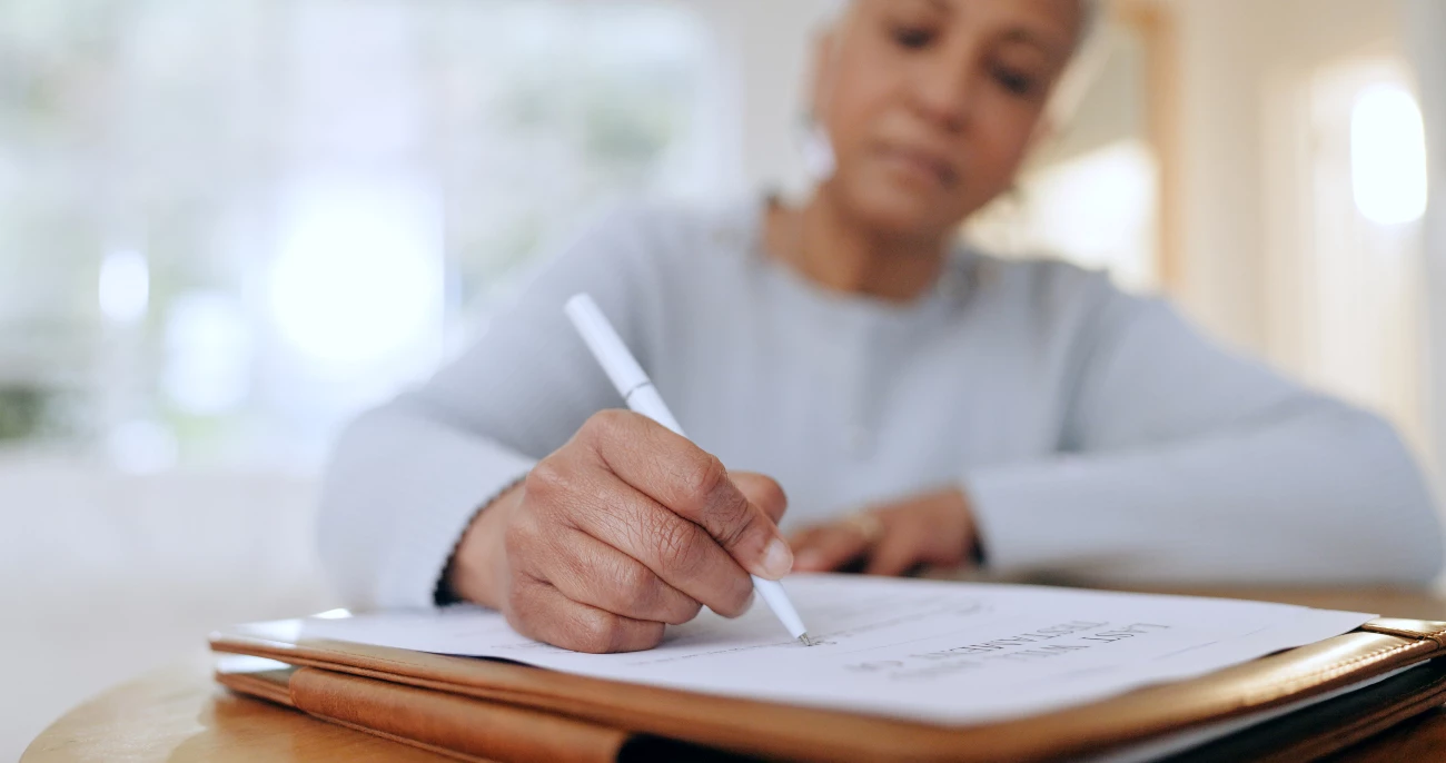Woman Writing A Checklist