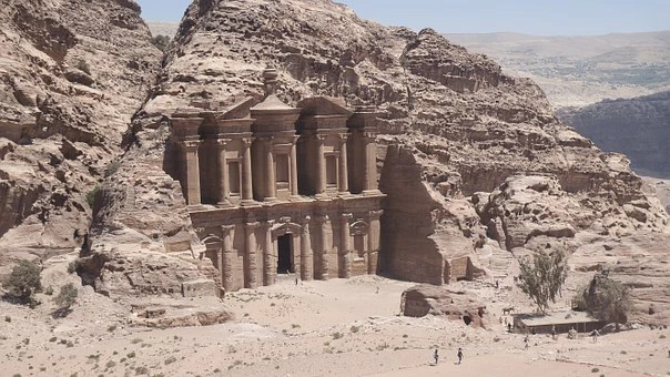 A view of the desert landscape in Petra, Jordan and the famous building carved into the rocks