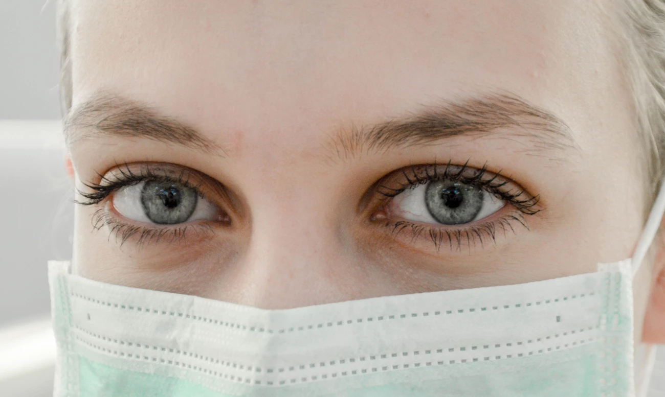 A woman wearing a medical mask