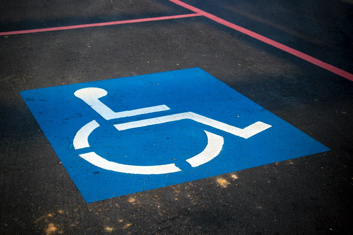 A disabled space in a parking area