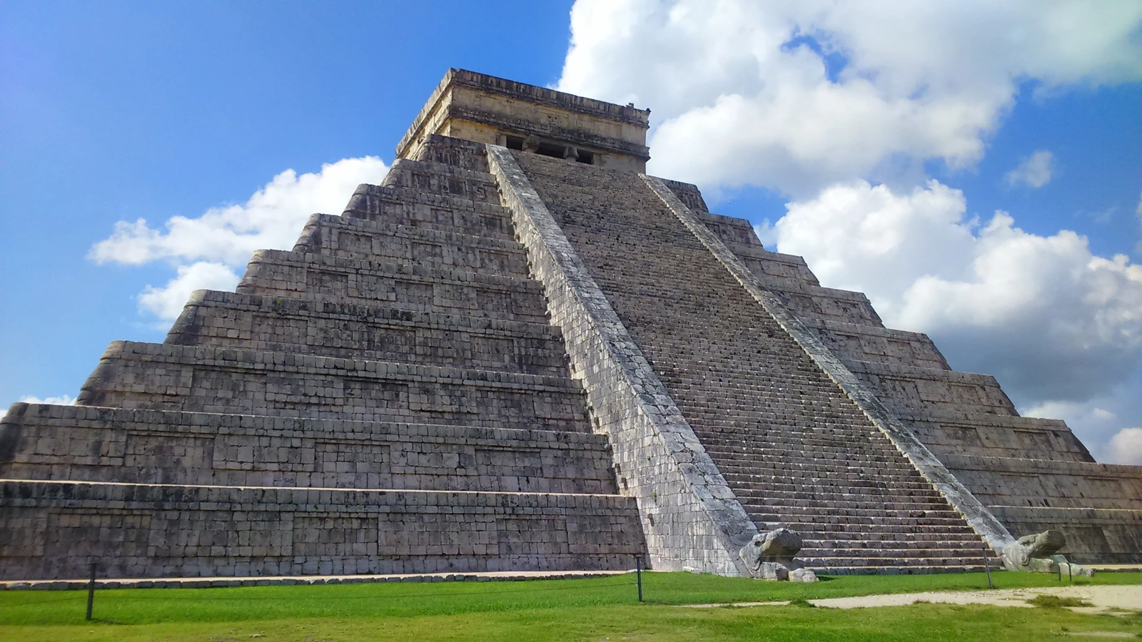 The large Mayan pyramid of Chichen Itza in Mexico on a sunny day