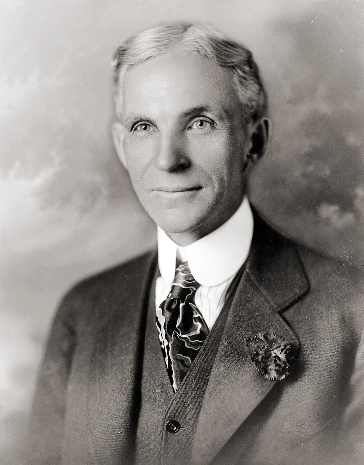 A black and white photograph of Henry Ford